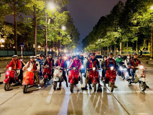 Zip through the Old Quarter as the city lights come alive.