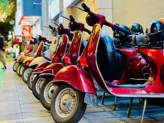 Ride into the heart of Hanoi’s nightlife on a retro Vespa.